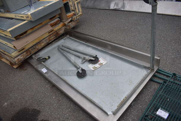 Stainless Steel Tabletop w/ Back Splash. Comes w/ Metal Under Shelf, 4 Legs and Commercial Casters. 72x36x45 - Image 1 of 3
