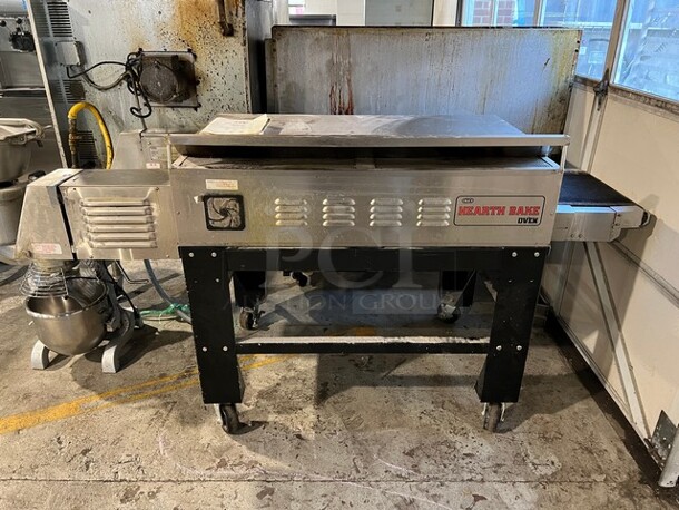 CTX HB4 Stainless Steel Commercial Floor Style Electric Powered Hearth Bake Conveyor Oven on Commercial Casters. Comes w/ Manual. 208 Volts, 3 Phase. 92x38x49