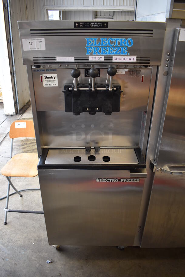 Electro Freeze 88T-CMT-113 Stainless Steel Commercial Water Cooled Floor Style 2 Flavor w/ Twist Soft Serve Ice Cream Machine on Commercial Casters. 230 Volts, 1 Phase. 26x40x69