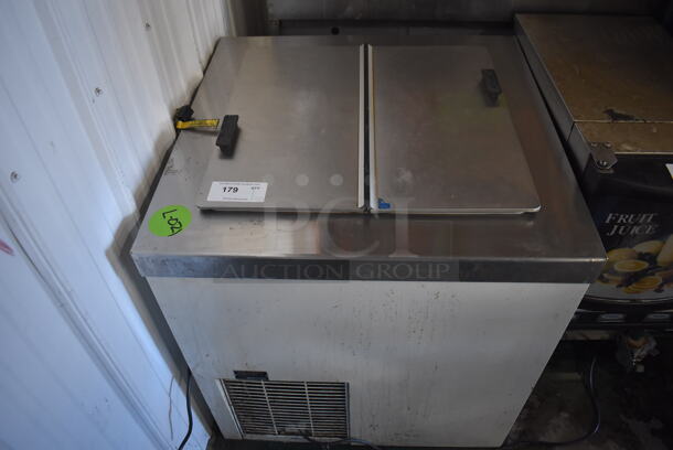 Stainless Steel Commercial Chest Freezer w/ Center Hinge Lid. 115 Volts, 1 Phase. 31x30.5x33. Tested and Powers On But Does Not Get Cold - Image 1 of 7