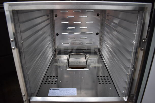 BRAND NEW SCRATCH AND DENT! Avantco 177HPU1812 Metal Commercial Undercounter Half Size Non-Insulated Heated Holding Cabinet on Commercial Casters. Stock Picture Used For Gallery. 120 Volts, 1 Phase. 20.5x31x31. Tested and Working! - Image 10 of 10
