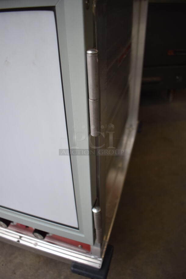 BRAND NEW SCRATCH AND DENT! Avantco 177HPU1812 Metal Commercial Undercounter Half Size Non-Insulated Heated Holding Cabinet on Commercial Casters. Stock Picture Used For Gallery. 120 Volts, 1 Phase. 20.5x31x31. Tested and Working! - Image 4 of 10