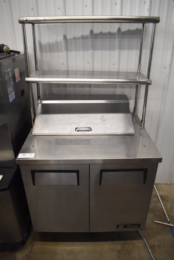 2013 True TSSU-36-08 Stainless Steel Commercial Sandwich Salad Prep Table Bain Marie Mega Top w/ 2 Tier Over Shelf on Commercial Casters. 115 Volts, 1 Phase. 36x30x69. Tested and Powers On But Does Not Get Cold