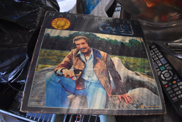 ALL ONE MONEY! Tier Lot of Various Items Including Tambourine, Extension Cord in Holder, Dust Pans, Bush Trimmer and Footloose Record Sleeve - Image 6 of 7