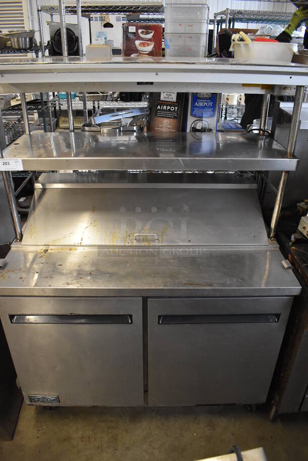 Arctic Air AST48R Stainless Steel Commercial Sandwich Salad Prep Table Bain Marie Mega Top w/ 2 Over Shelves on Commercial Casters. 115 Volts, 1 Phase. 48x30x66. Tested and Powers On But Does Not Get Cold