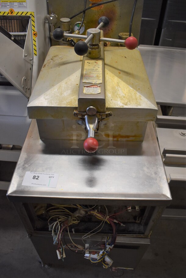 Henny Penny 600 Stainless Steel Commercial Floor Style Natural Gas Powered Pressure Fryer on Commercial Casters. Missing Front Panel. 80,000 BTU. 18x39x49 - Image 1 of 9