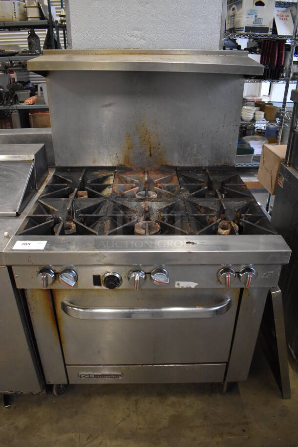 Southbend Stainless Steel Commercial Propane Gas Powered 6 Burner Range w/ Oven, Over Shelf and Back Splash on Commercial Casters. 37x34x60 - Image 1 of 8