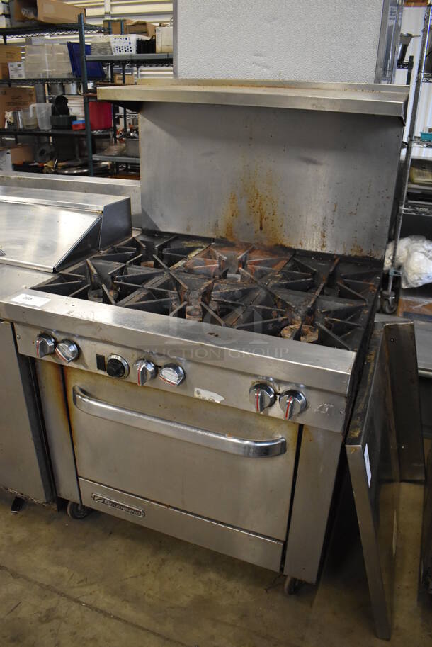Southbend Stainless Steel Commercial Propane Gas Powered 6 Burner Range w/ Oven, Over Shelf and Back Splash on Commercial Casters. 37x34x60 - Image 3 of 8