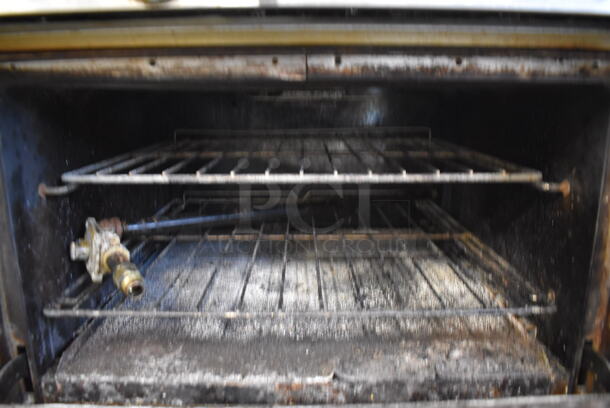 Southbend Stainless Steel Commercial Propane Gas Powered 6 Burner Range w/ Oven, Over Shelf and Back Splash on Commercial Casters. 37x34x60 - Image 7 of 8
