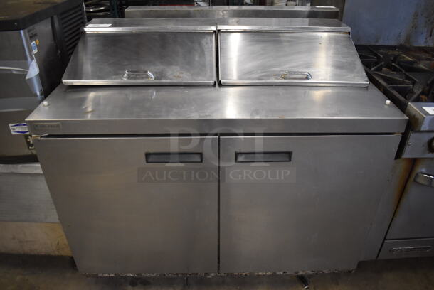 2019 Delfield 4448N-12 Stainless Steel Commercial Sandwich Salad Prep Table Bain Marie Mega Top on Commercial Casters. 115 Volts, 1 Phase. 48x32x42. Tested and Powers On But Does Not Get Cold