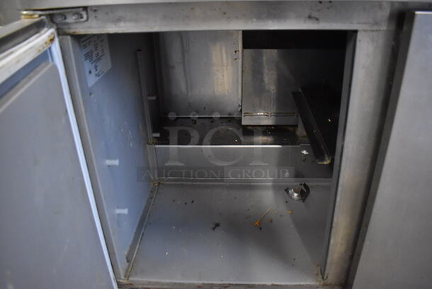 2019 Delfield 4448N-12 Stainless Steel Commercial Sandwich Salad Prep Table Bain Marie Mega Top on Commercial Casters. 115 Volts, 1 Phase. 48x32x42. Tested and Powers On But Does Not Get Cold - Image 7 of 8