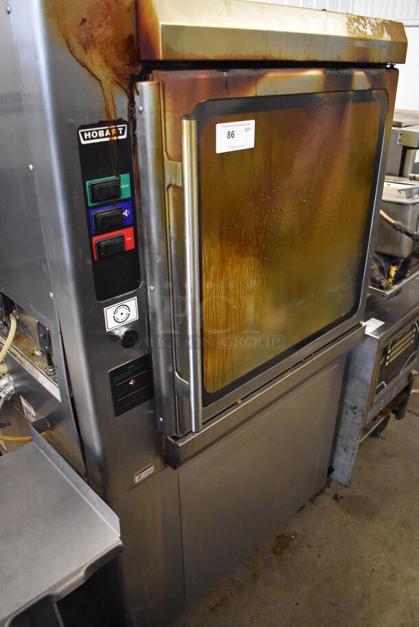 Hobart KA7E Stainless Steel Commercial Floor Style Electric Powered Self Cleaning Rotisserie Oven on Commercial Casters. 208 Volts, 3/1 Phase. 38x35x71 - Image 2 of 12