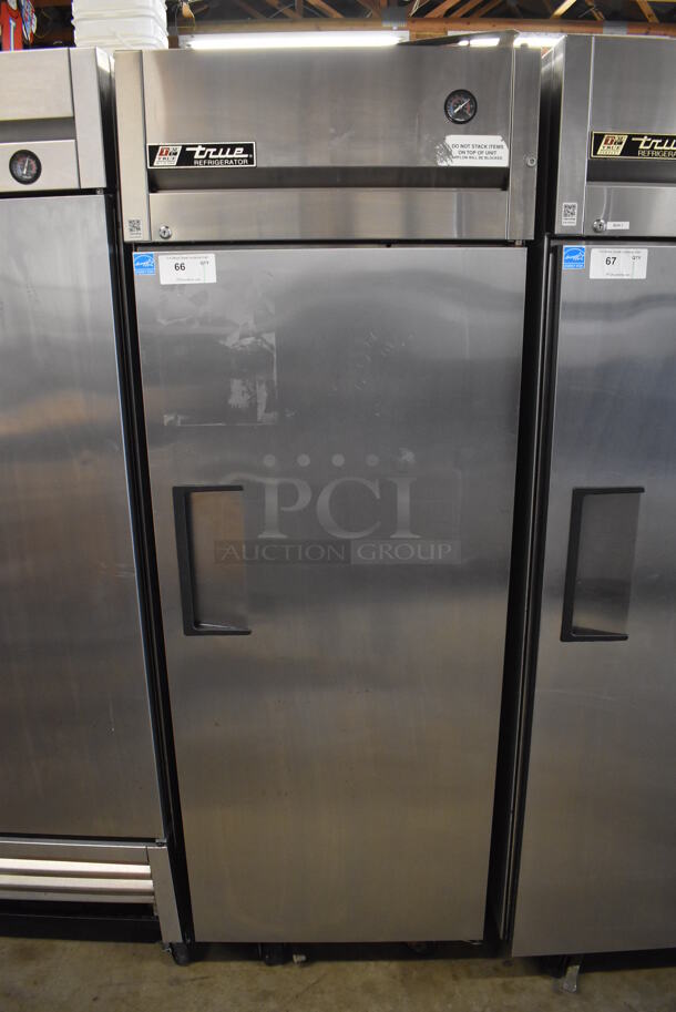 2011 True TG1R-1S ENERGY STAR Stainless Steel Commercial Single Door Reach In Cooler w/ Poly Coated Racks on Commercial Casters. 115 Volts, 1 Phase. 29x35x83. Tested and Working!