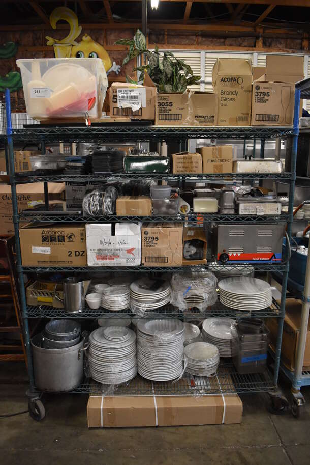 ALL ONE MONEY! Metro Lot of Various Items Including BRAND NEW IN BOX Glassware, Ceramic Dishes and Stock Pots. Does Not Include Shelving Unit - Image 1 of 10