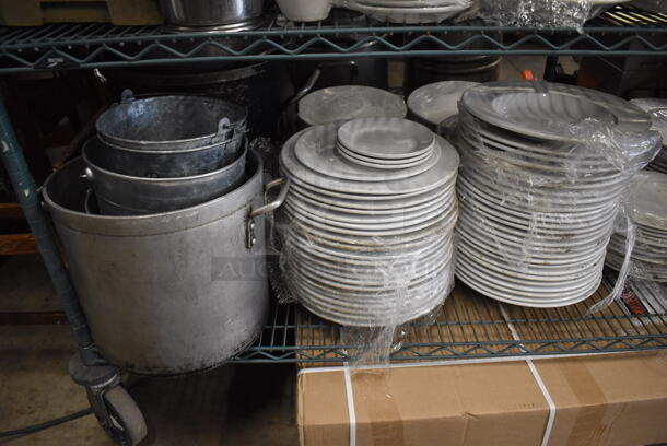 ALL ONE MONEY! Metro Lot of Various Items Including BRAND NEW IN BOX Glassware, Ceramic Dishes and Stock Pots. Does Not Include Shelving Unit - Image 10 of 10