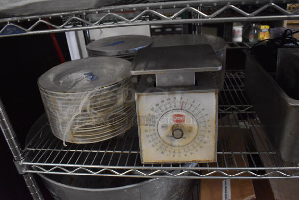 ALL ONE MONEY! Metro Lot of Various Items Including Metal Chafing Dish Frames, Ceramic Dishes, Metal Baking Pans, Koala Diaper Changing Station and Slicer. Does Not Include Shelving Unit - Image 4 of 12