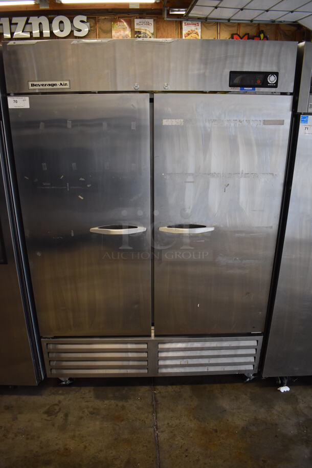 Beverage Air KF48-1AS Stainless Steel Commercial 2 Door Reach In Freezer w/ Poly Coated Racks on Commercial Casters. 54.5x34x83. Tested and Working!