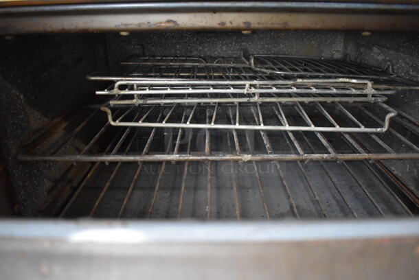 Garland Metal Commercial Natural Gas Powered 4 Burner Range w/ Flat Top Griddle, 2 Ovens, Over Shelf and Back Splash. 64x32x60 - Image 7 of 9