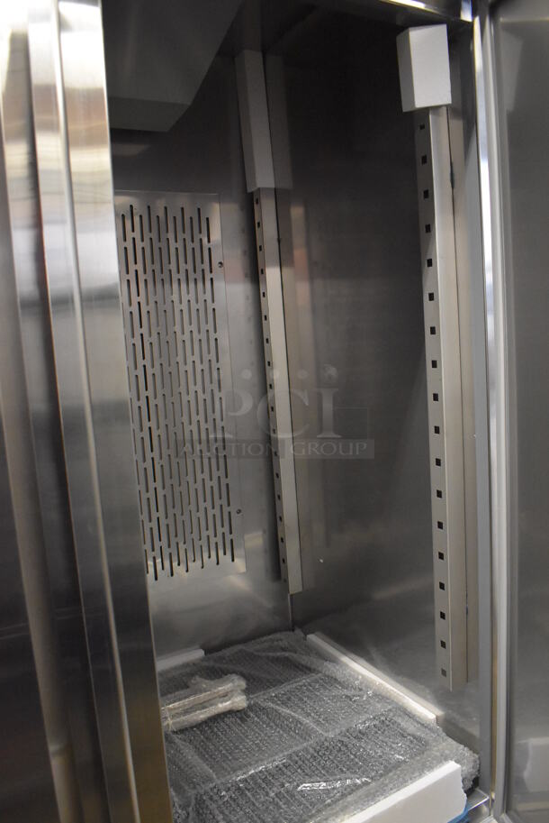 BRAND NEW SCRATCH AND DENT! Avantco 178SS2FHC Stainless Steel Commercial 2 Door Reach In Freezer w/ Poly Coated Racks on Commercial Casters. 115 Volts, 1 Phase. 54x34x82. Tested and Working! - Image 8 of 11