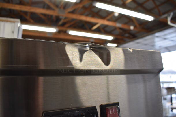 BRAND NEW SCRATCH AND DENT! Avantco 178SS2FHC Stainless Steel Commercial 2 Door Reach In Freezer w/ Poly Coated Racks on Commercial Casters. 115 Volts, 1 Phase. 54x34x82. Tested and Working! - Image 9 of 11