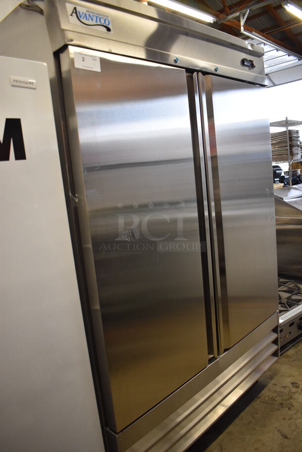 BRAND NEW SCRATCH AND DENT! Avantco 178SS2FHC Stainless Steel Commercial 2 Door Reach In Freezer w/ Poly Coated Racks on Commercial Casters. 115 Volts, 1 Phase. 54x34x82. Tested and Working! - Image 11 of 11