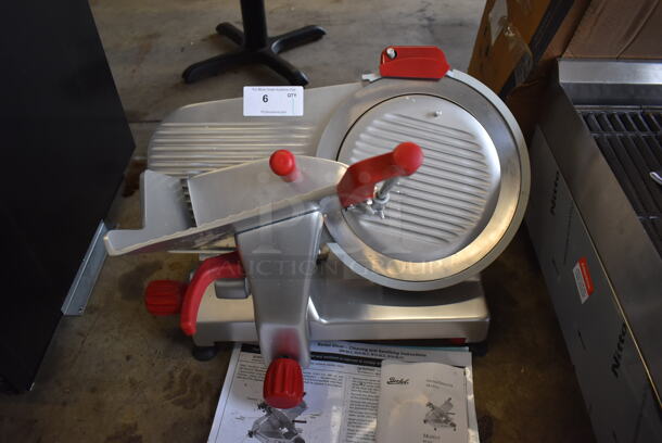 BRAND NEW SCRATCH AND DENT! 2022 Berkel B14-SLC Stainless Steel Commercial Countertop Meat Slicer w/ Blade Sharpener. Missing Center Plate Locking Knob. 115 Volts, 1 Phase. 27x26x26. Tested and Does Not Power On - Needs New Power Switch
