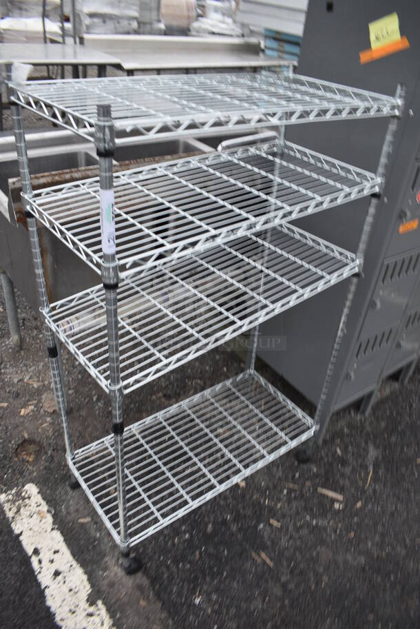 Chrome Finish 4 Tier Wire Shelving Unit on Casters. BUYER MUST DISMANTLE. PCI CANNOT DISMANTLE FOR SHIPPING. PLEASE CONSIDER FREIGHT CHARGES. 30x14x50