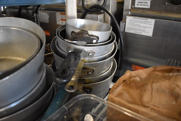 ALL ONE MONEY! Tier Lot of Various Items Including Silverware, Silverware Holder, Poly Bin and 12 Metal Sauce Pans - Image 5 of 6