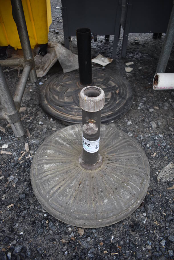 2 Metal Patio Umbrella Bases. 16x16x13, 20x20x13. 2 Times Your Bid! - Image 1 of 3