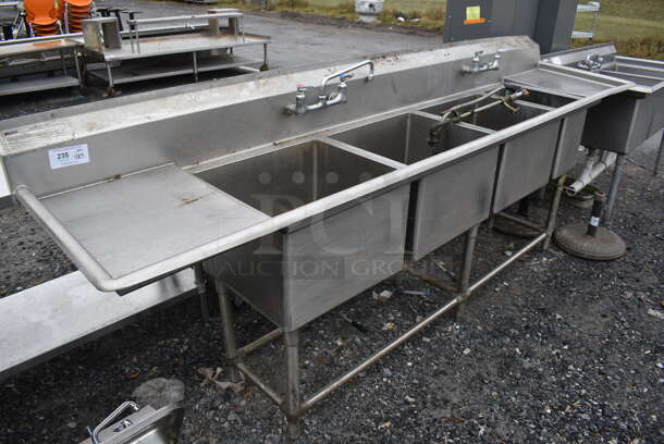 Stainless Steel Commercial 4 Bay Sink w/ Dual Drain Boards, Faucet, 2 Handle Sets and Spray Nozzle Attachment. 114x27x44. Bays 20x18x14, 10x18x14. Drain Boards 16x21x1 - Image 1 of 5