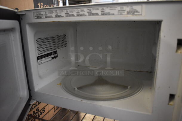 ALL ONE MONEY! Tier Lot of Various Items Including General Electric JES738WJ 02 Microwave Oven, Hamilton Beach Food Processor and 3 Black & Decker 4 Slot Toasters - Image 3 of 7