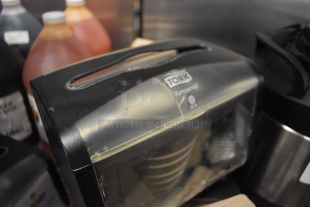 6 Tork Xpressnap Clear and Black Poly Countertop Napkin Dispensers. 8x6x6. 6 Times Your Bid! - Image 5 of 5