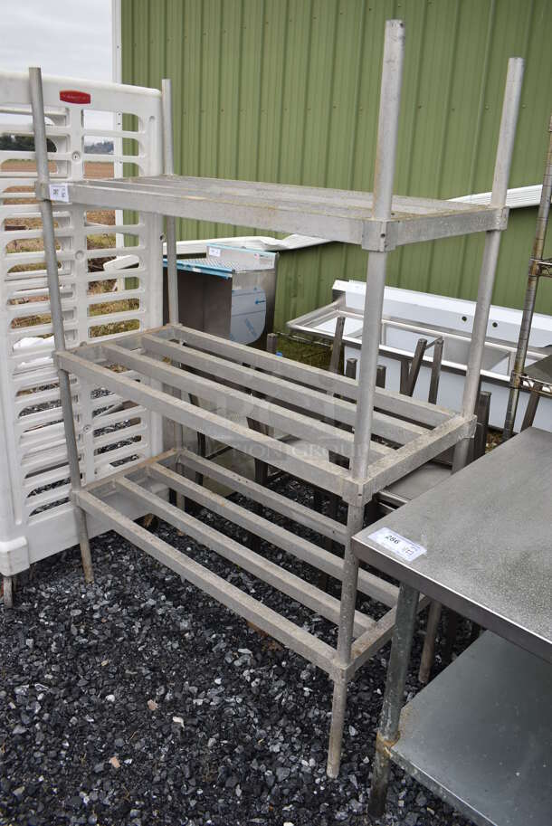 Metal 3 Tier Dunnage Style Shelving Unit. BUYER MUST DISMANTLE. PCI CANNOT DISMANTLE FOR SHIPPING. PLEASE CONSIDER FREIGHT CHARGES. 48x21x68 - Image 1 of 3