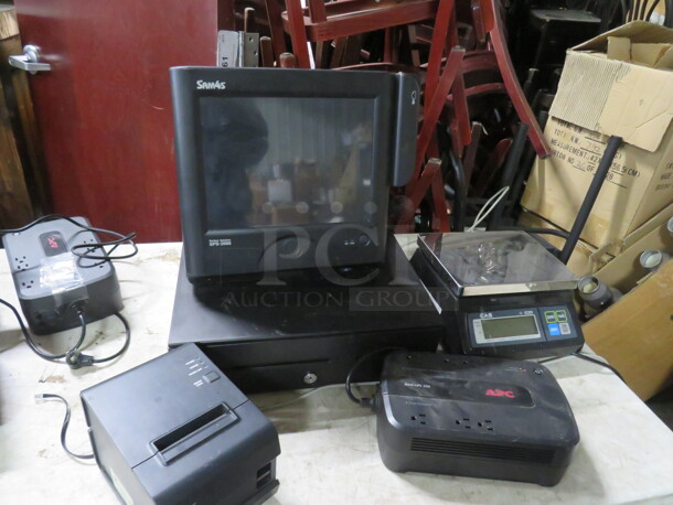 One SAM4S POS System Including 1 SPS-2000 Terminal, Cash Drawer, Thermal Printer #Ellix-2011, And 1 APC Battery Backup #ups350. - Image 1 of 1