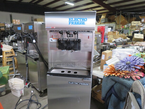 One WORKING Electro Freeze 2 Flavor Twist Soft Serve Machine On Casters. Model# 99T-RMT-132. 208-230 Volt. 3 Phase. Ser# G2P-2601.