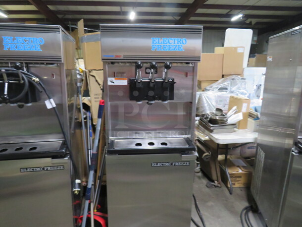 One WORKING Electro Freeze 2 Flavor Twist Soft Serve Machine On Casters. Model# 99T-RMT-132. 208-230 Volt. 3 Phase. Ser# G2P-2621. - Image 1 of 5