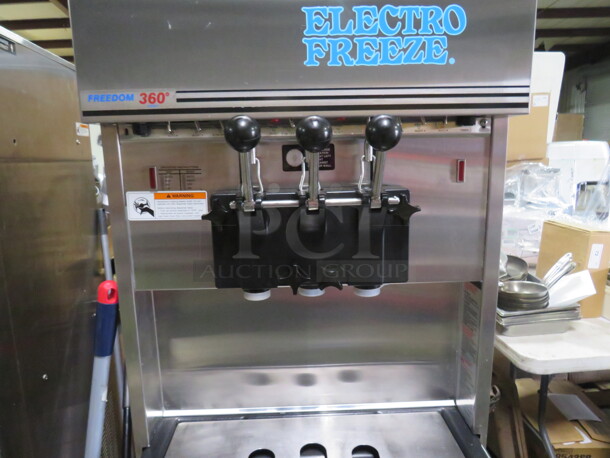 One WORKING Electro Freeze 2 Flavor Twist Soft Serve Machine On Casters. Model# 99T-RMT-132. 208-230 Volt. 3 Phase. Ser# G2P-2621. - Image 2 of 5