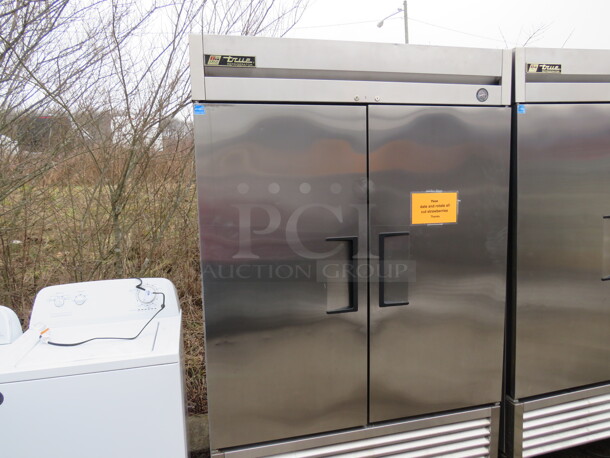 One WORKING Stainless Steel True 2 Door Refrigerator With 6 Racks On Casters. Model# T-49. 115 Volt. 49X30X82