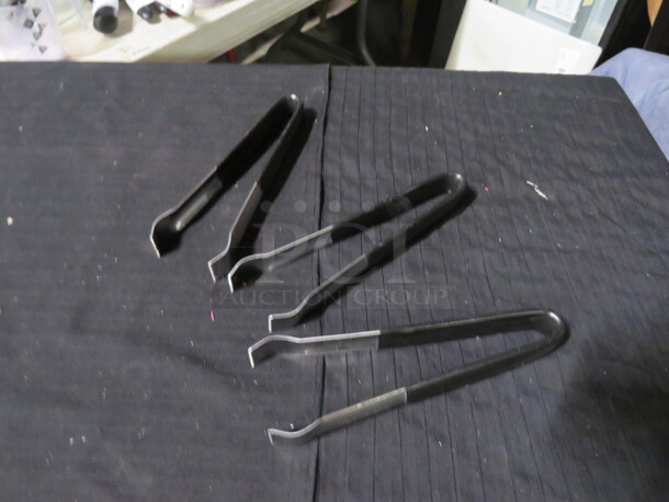 Vollrath Tong With Kool Touch Handle. #47326. $12.50 each.  3XBID - Image 1 of 1