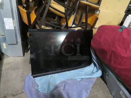 One 40 Inch Vizio Flatscreen TV With Wall Mount Bracket. 120 Volt. Model# E422VA.