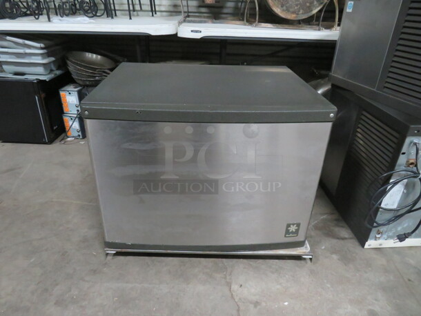 One Air Cooled 430lb Manitowic Ice Head. Model# QDO452A. 115 Volt. Unable To Test. 30X24.5X22. $3585.00.