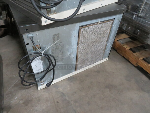 One Air Cooled 430lb Manitowic Ice Head. Model# QDO452A. 115 Volt. Unable To Test. 30X24.5X22. $3585.00. - Image 2 of 2
