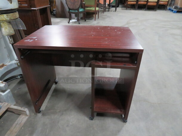 One Desk On Casters. 36X26X31 - Image 1 of 2