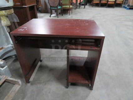 One Desk On Casters. 36X26X31
