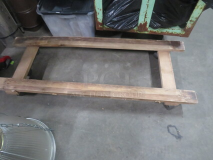 One 48X18X4.5 Wooden Dolly.