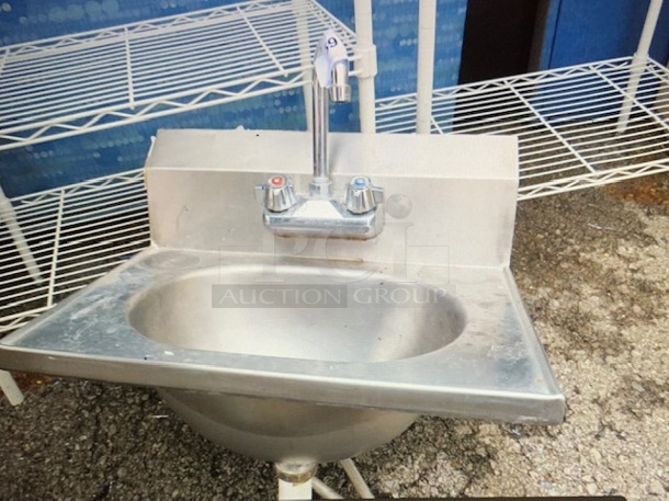 One Stainless Steel Hand Sink With Faucet And Back Splash. 19X15