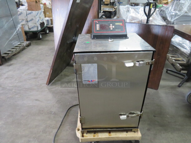One Cook Shack Smoker On Casters. Model# SMO66. 120 Volt. 20.5X19X37. $2205.00