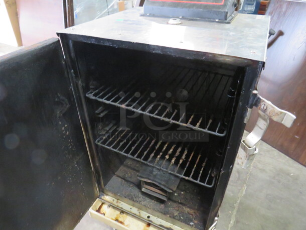 One Cook Shack Smoker On Casters. Model# SMO66. 120 Volt. 20.5X19X37. $2205.00 - Image 3 of 3