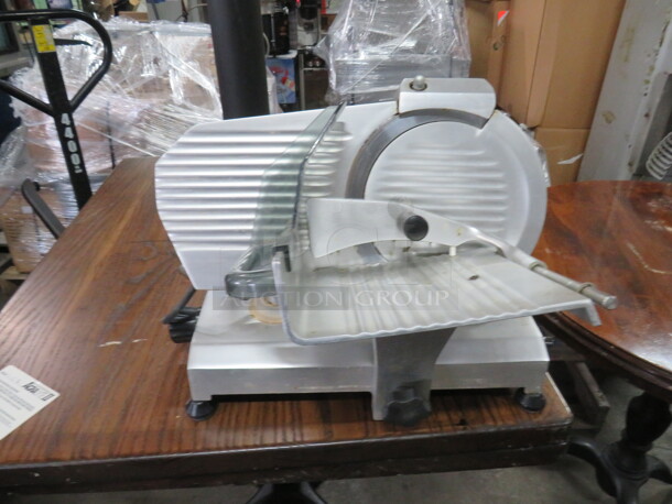 One Eurodib  9 Inch Deli Slicer. 120 Volt. Model# TOPAZ 220U. 