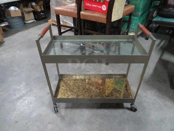 One Metal 2 Shelf Serving Cart With Glass Shelves And Leather Handles, On Casters. 32.5X13.5X32 - Image 1 of 2